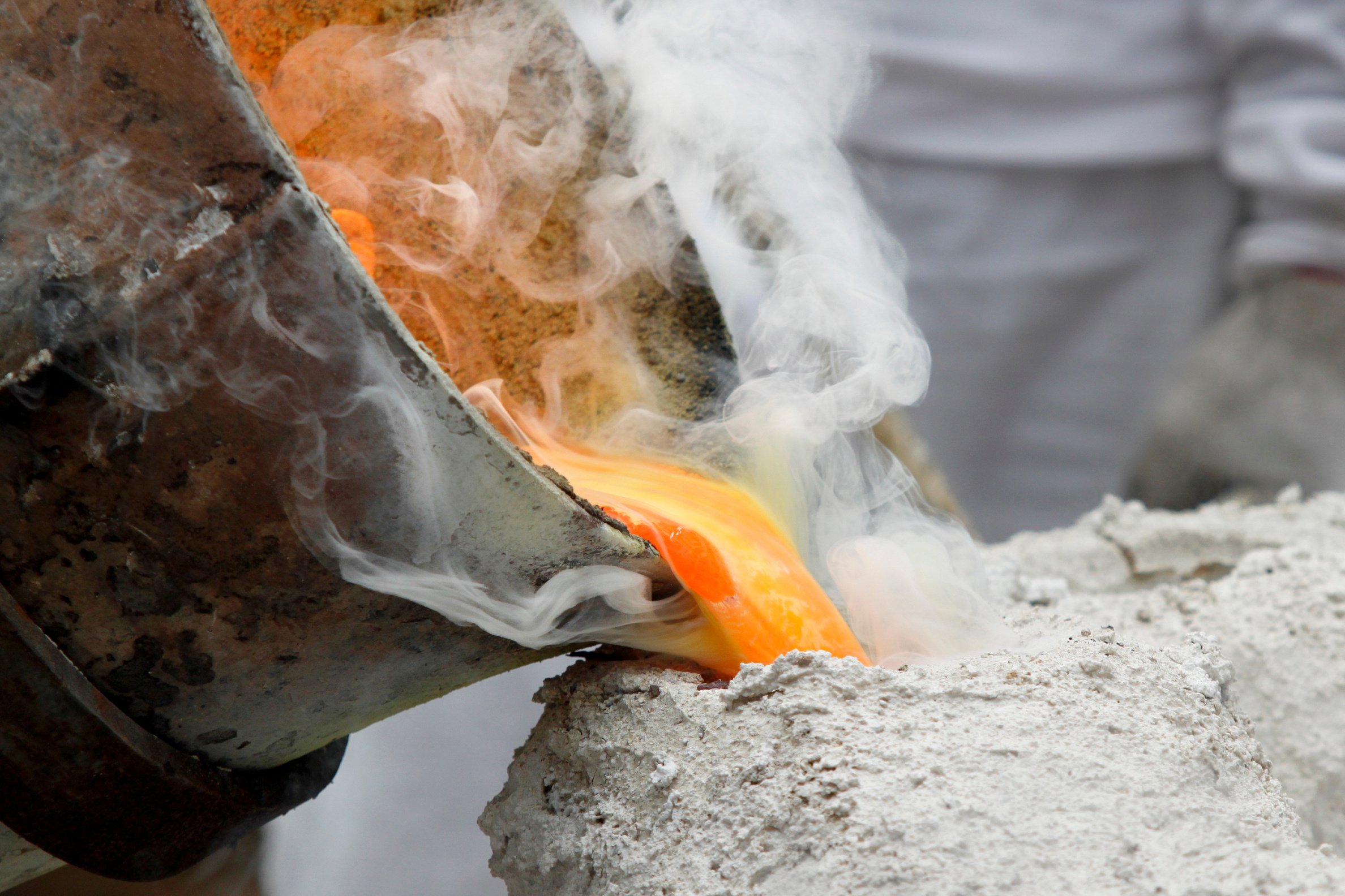 Pouring Liquid Metal into Mold